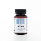 The Mossi London 2 Months Flacon Plus Hair Set featuring hair care bottles and styling tools in a sleek package.
